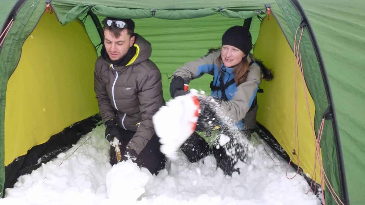 Shoveling out the tent vestibule