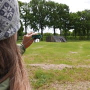Compass course shooting in a meadow Discover your passion for adventure during a workshop in Utrecht! With a green compass in hand, our guide shows you the way through fields and forests. Perfect for nature lovers who embrace challenges. Join us and experience the adventure up close!