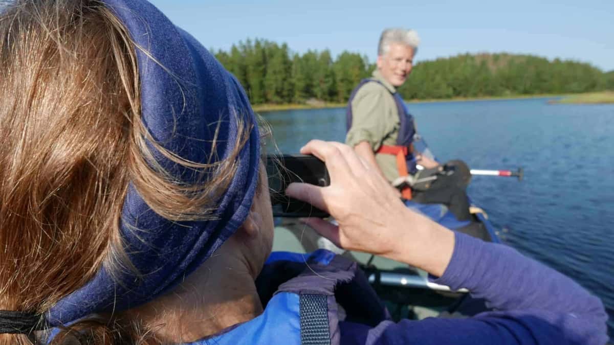 Photographing during the canoe trek in Blekinge