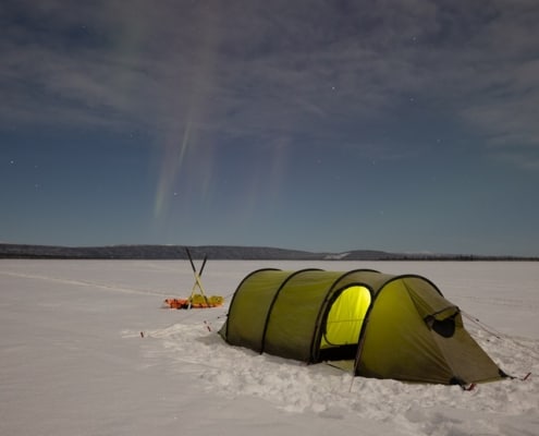 Camping under the Northern Lights in Northern Sweden