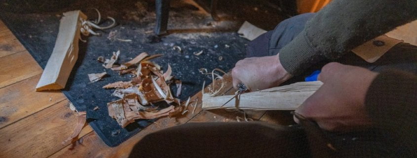 Making feather sticks to get a fire going Making feather sticks to get a fire going